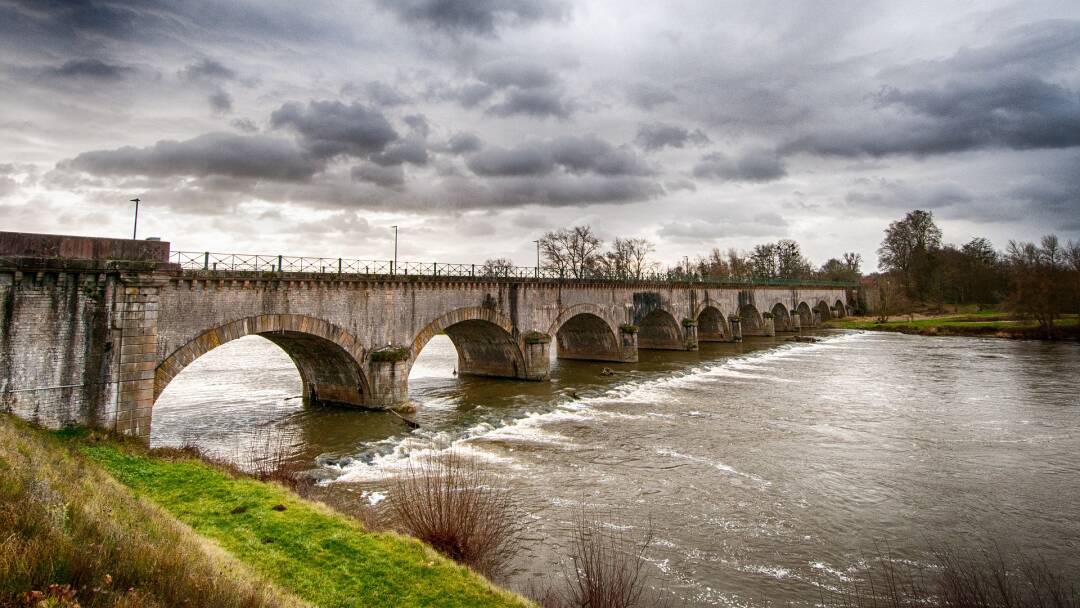 The Digoin Canal Bridge, one of the first canal bridges in France. It is a beautiful place to walk along the canal with the Loire at your feet.