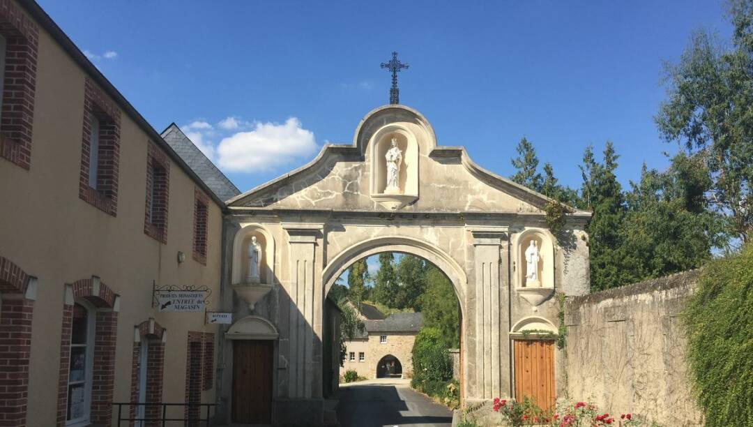 The Notre-Dame du Port-du-Salut d&#39;Entrammes abbey, built in the 13th century, was once known for its cheese-making. They are still on sale at the entrance of the abbey, so take advantage of it ! Radio France - Claire Flochel