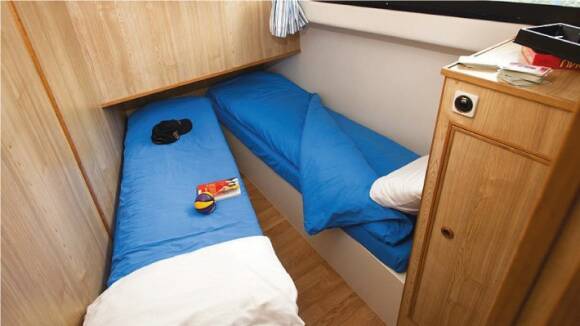Elegance - Portside Central Cabin choice of 1 Double Bed or 2 Single Beds