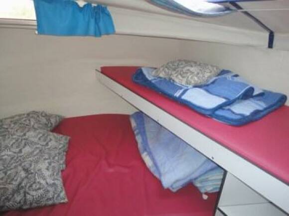 Riviera 1130 A - Front Cabin with a Double Bed and a Single Bed